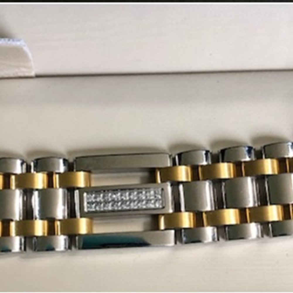 8.5 inch two-tone gold/silver men's bracelet.  Never worn.